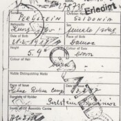The inside of Sidonia’s DP identification card, marked EMIGRATED Emigrated
